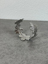 Armreif Blütendesign silbern