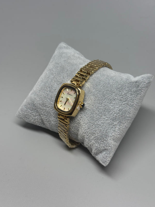 Goldene Armbanduhr mit Perlmutt-Zifferblatt – Feminin, fein & luxuriös