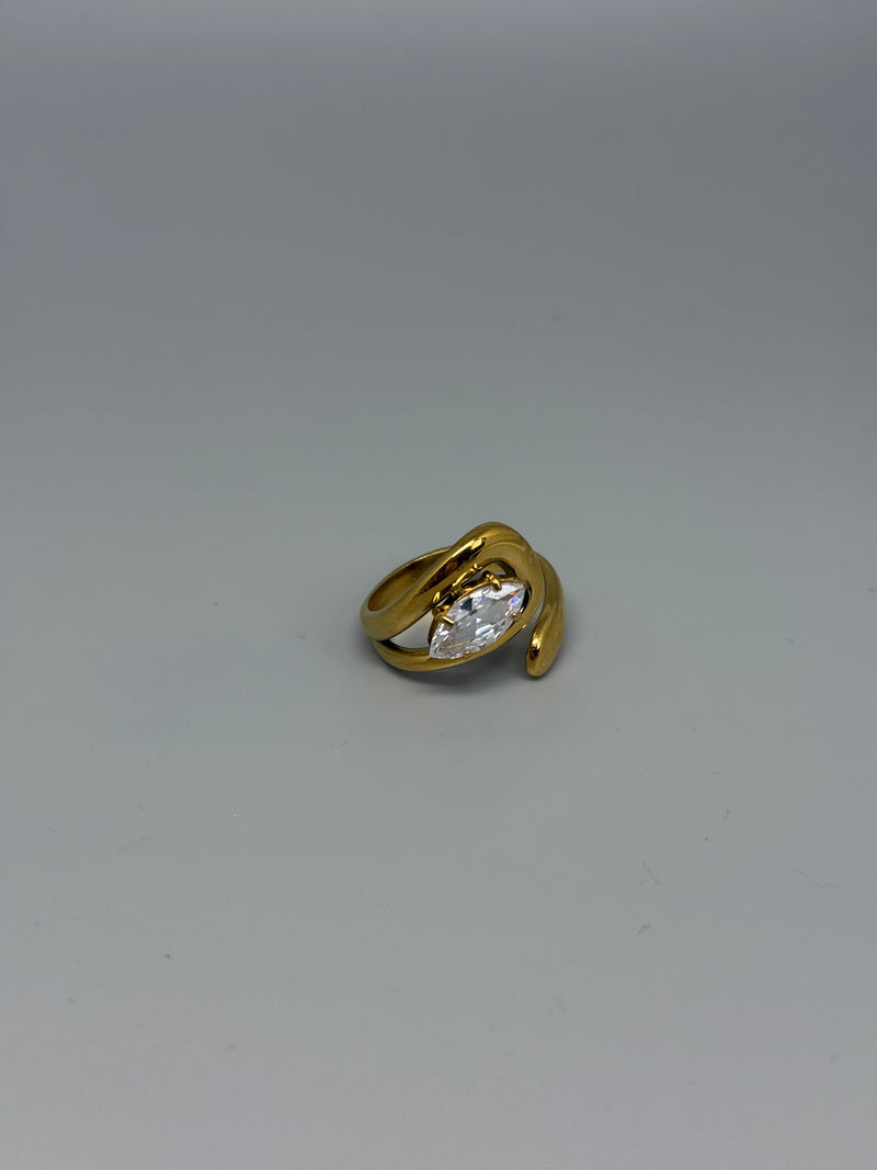Verstellbarer Ring mit grossem Glitzerstein – elegante Form mit geschwungenen Details